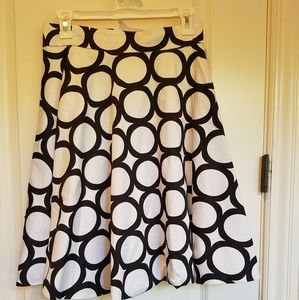 A-line, black and white skirt.